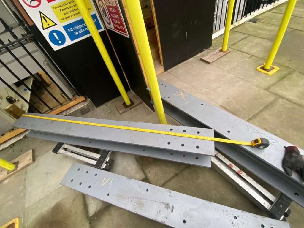 steel fabrication, basement support, structural steel, london construction, steel beam installation, bespoke steelwork, steel engineering, basement conversion, steel splicing, heavy duty beams, precision fabrication, metal fabrication