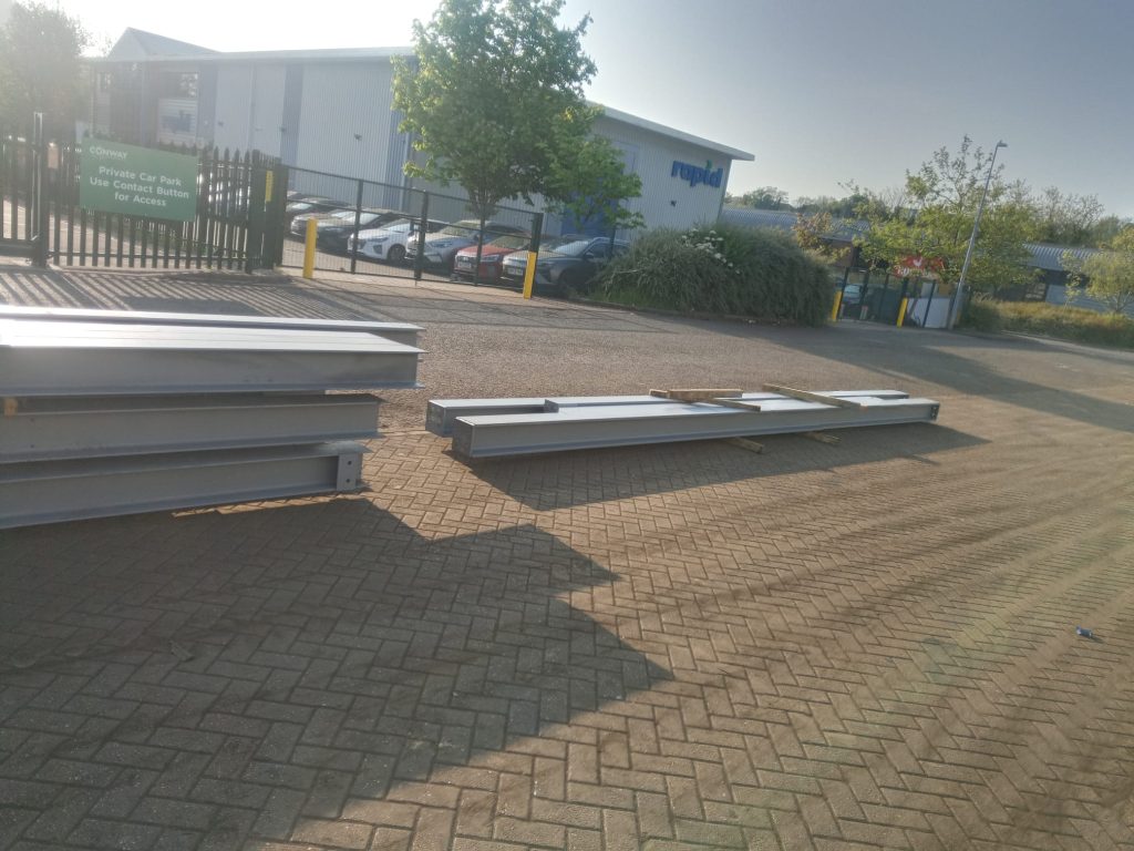 custom steel, steel cutting, steel installation, fabricated beams, steel welding, steel coating, hiab delivery, steel yard, qa inspection, building extension, rear extension steel, construction site steel