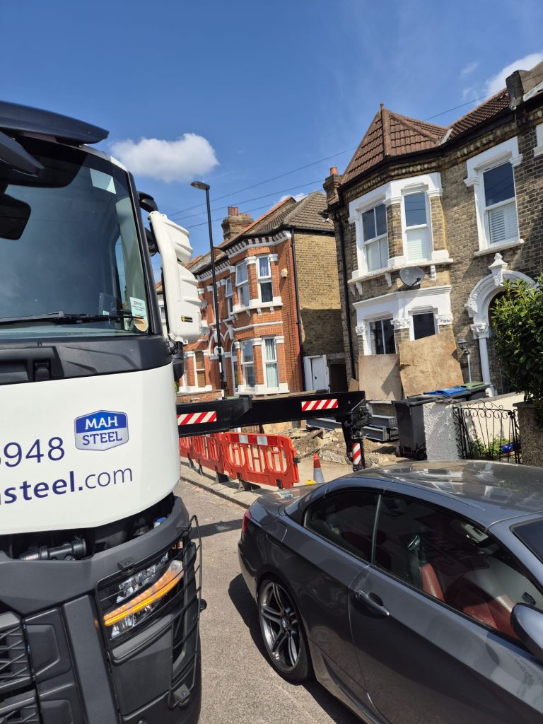 steel installation, steel erection, hiab crane, steel positioning, site installation, on-site steelwork, london steel delivery, structural steel erection, south west london installation, steel framework, crane lifting steel, residential steel install