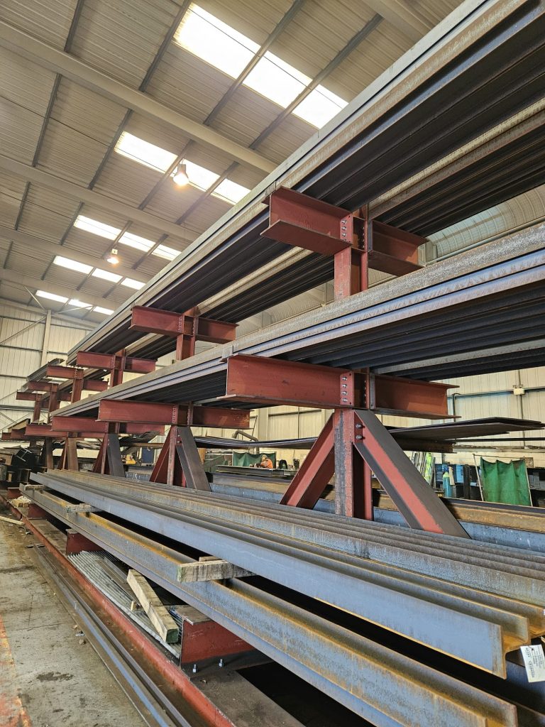 structural beams, universal beams, rsj beams, goalpost beams, steel beam fabrication, primed beams, beam installation, heavy beams, cut steel beams, beam welding, fabricated beams, beam connections