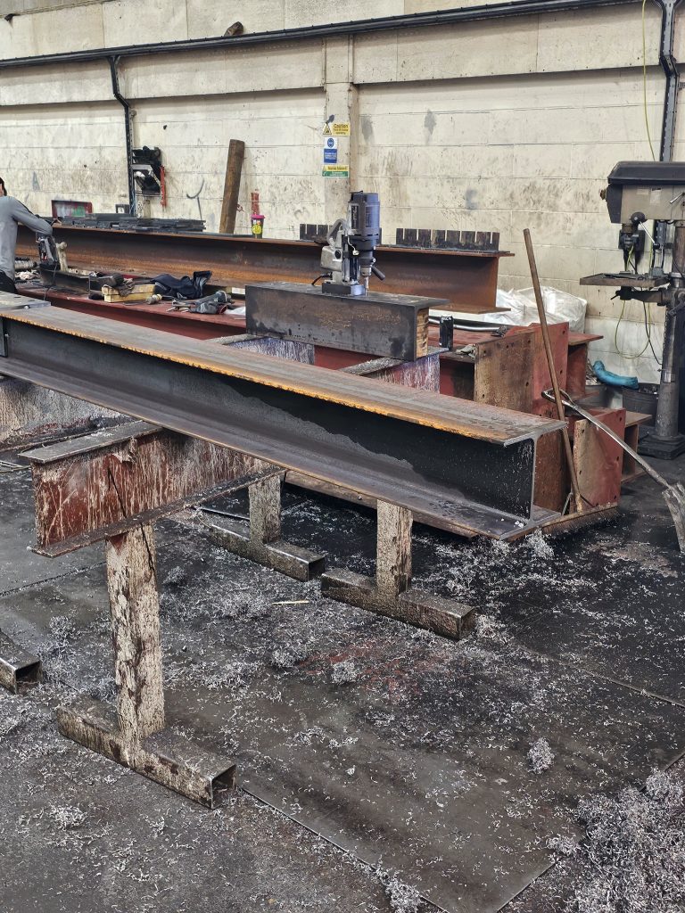 steel extension London, London steel extension, steel detailing, london construction project, custom beams, steel frame extension, kent steel supplier, steel delivery service, residential builders, fabricated supports, structural engineering steel, house extension project, london home renovation, steel primer finish