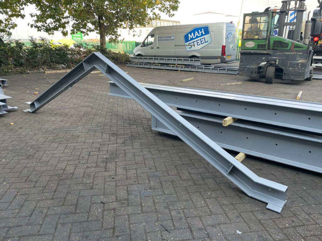 cranked roof beams, steel fabrication services UK, structural steel delivery Surrey, coded fabricators UK, steel welding Oxted, steel workshop Surrey, fabricated steel beams UK, structural steel supplier South East, residential extension steelwork, zinc primed steel beams, steel fabrication company Surrey, custom structural steel Oxted